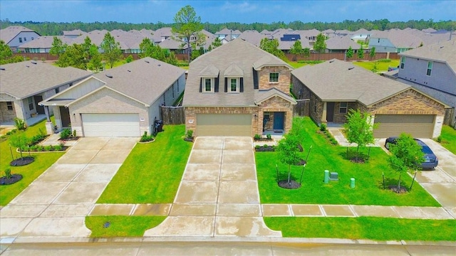 view of front of house featuring a garage, brick siding, a residential view, and driveway