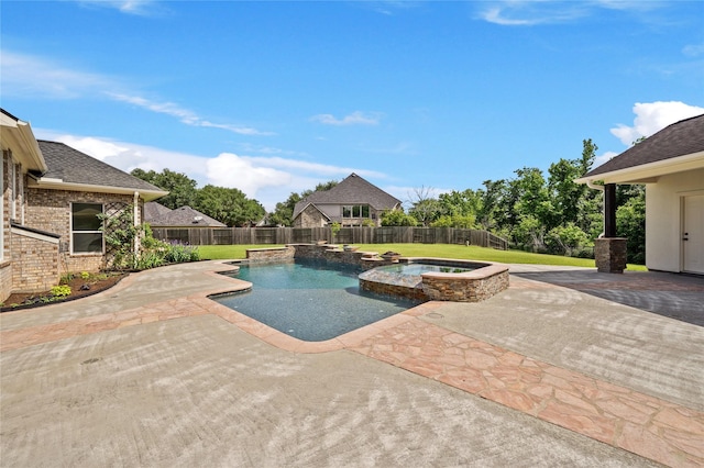 view of pool with a yard, a fenced backyard, and a patio area