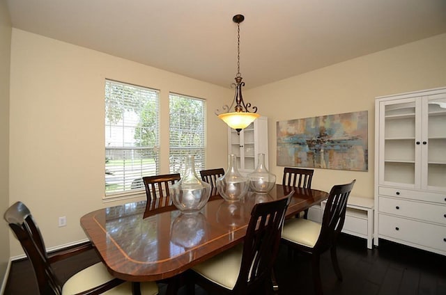 5002 Hearth Hollow Ln, Sugar Land, TX 77479 - dining room featuring plenty of natural light, baseboards, and dark wood-style floors