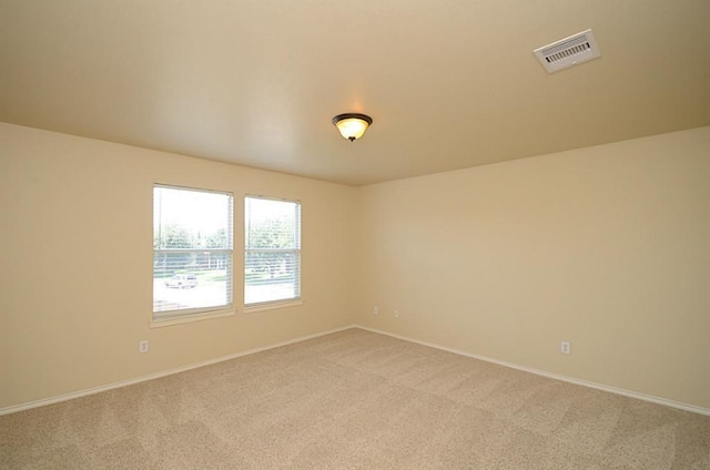 5002 Hearth Hollow Ln, Sugar Land, TX 77479 - empty room with carpet flooring, baseboards, and visible vents