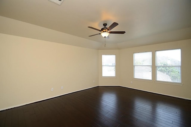 5002 Hearth Hollow Ln, Sugar Land, TX 77479 - unfurnished room featuring baseboards, a ceiling fan, and dark wood-style flooring