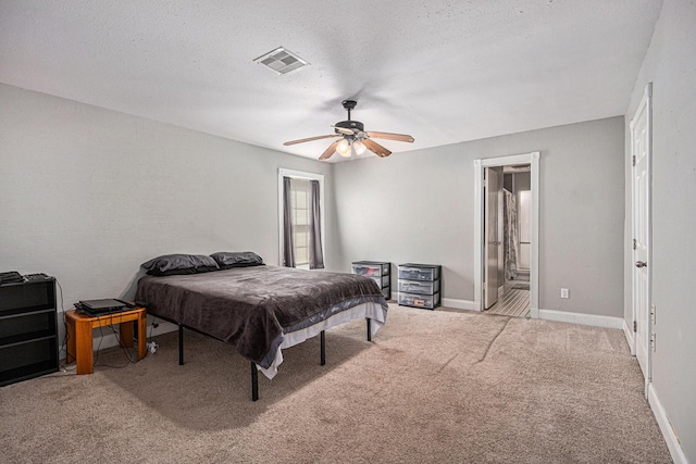 13126 Birch Grove Dr, Houston, TX 77099 - bedroom with a textured ceiling, visible vents, baseboards, carpet floors, and a ceiling fan