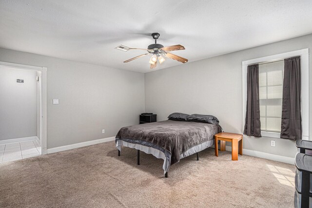 13126 Birch Grove Dr, Houston, TX 77099 - bedroom featuring visible vents, ceiling fan, light colored carpet, and baseboards