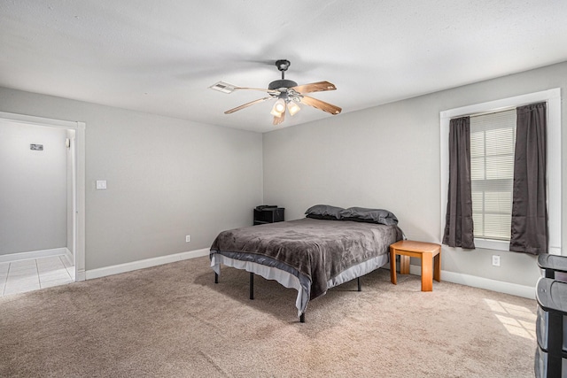 13126 Birch Grove Dr, Houston, TX 77099 - bedroom featuring visible vents, ceiling fan, light colored carpet, and baseboards