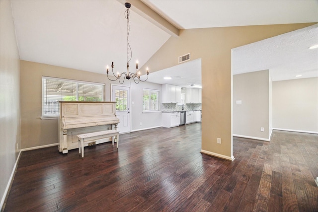 interior space with baseboards, dark wood-style flooring, a chandelier, and visible vents