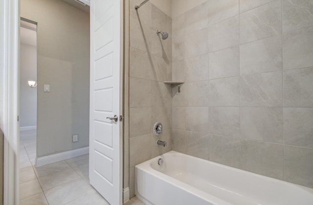 full bathroom featuring tile patterned floors, baseboards, and shower / bathing tub combination