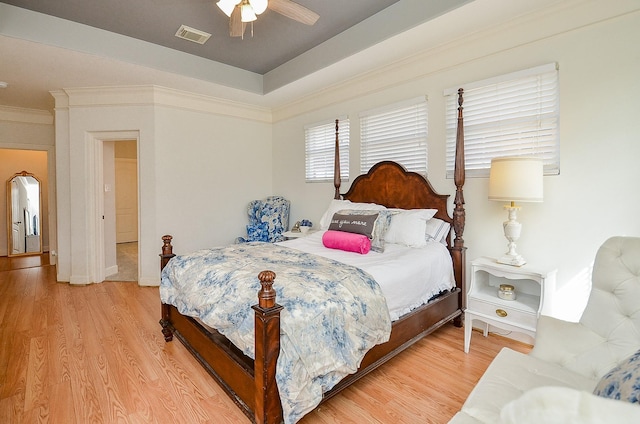 1615 Lakeside Enclave Dr, Houston, TX 77077 - bedroom featuring light wood-style flooring, crown molding, and ceiling fan