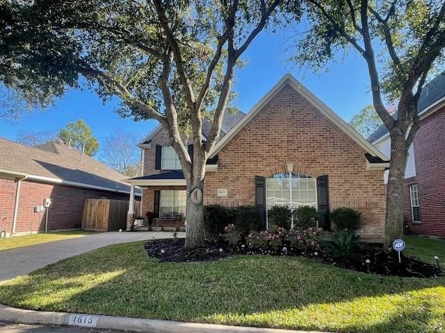 1615 Lakeside Enclave Dr, Houston, TX 77077 - traditional-style house featuring brick siding