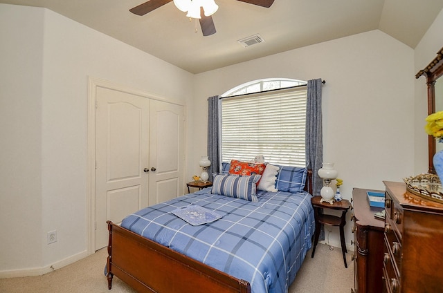 1615 Lakeside Enclave Dr, Houston, TX 77077 - bedroom with light carpet, baseboards, a closet, and a ceiling fan