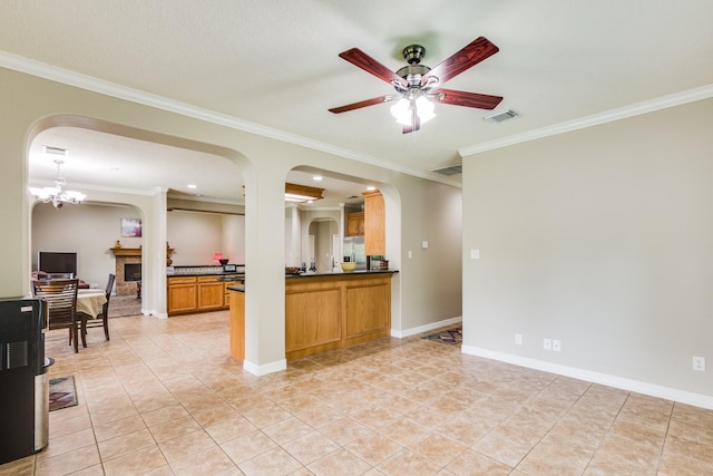 living room with visible vents, arched walkways, light tile patterned flooring, ornamental molding, and a ceiling fan