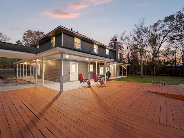 31235 Edgewater Dr, Magnolia, TX 77354 - deck at dusk featuring grilling area