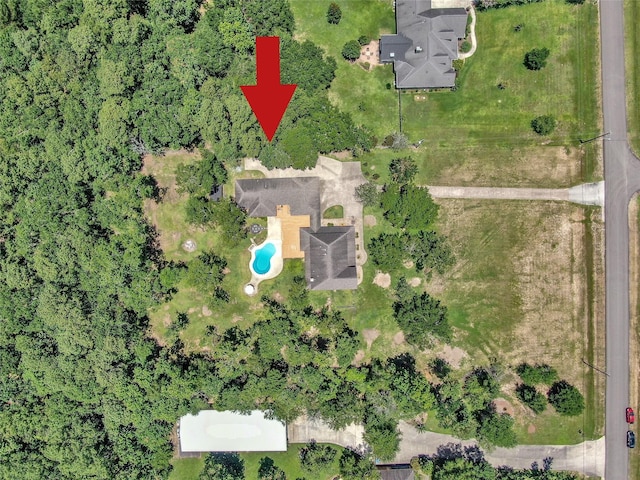 31235 Edgewater Dr, Magnolia, TX 77354 - aerial view of property and surrounding area with a pool area