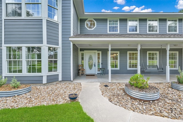 31235 Edgewater Dr, Magnolia, TX 77354 - property entrance with a porch