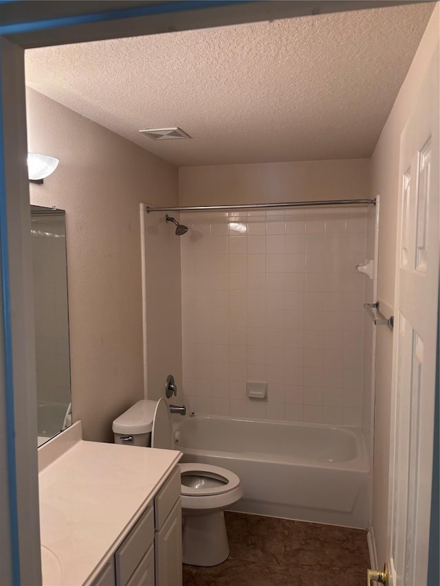 full bath with a textured ceiling, visible vents, shower / bathtub combination, toilet, and vanity