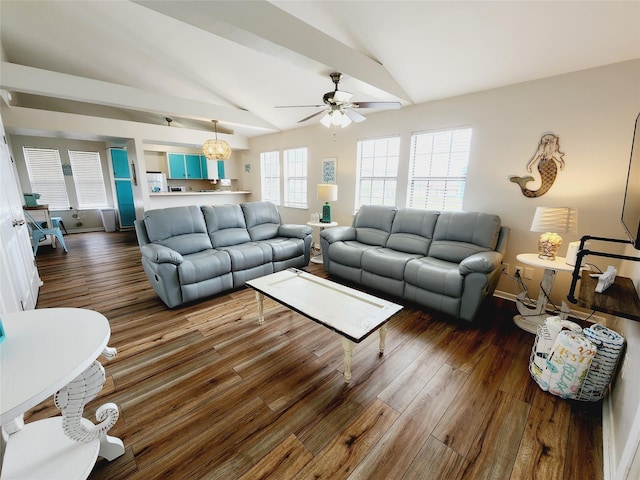 16606 John Davis Rd, Jamaica Beach, TX 77554 - living area with dark wood-type flooring, a ceiling fan, vaulted ceiling, and baseboards