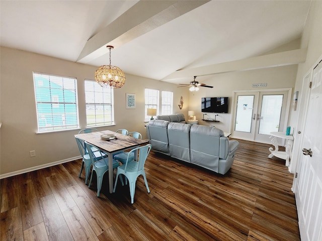 16606 John Davis Rd, Jamaica Beach, TX 77554 - dining area with lofted ceiling, baseboards, dark wood finished floors, french doors, and ceiling fan with notable chandelier