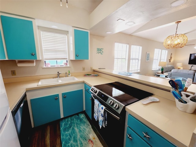 16606 John Davis Rd, Jamaica Beach, TX 77554 - kitchen with dark wood-style floors, a sink, a peninsula, electric range, and open floor plan