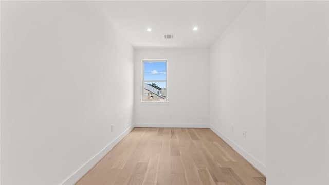 9302 Bassoon Dr, Houston, TX 77025 - spare room featuring light wood-type flooring and recessed lighting