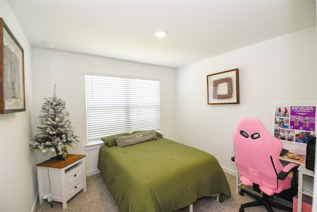 1219 Ricasoli Dr, Richmond, TX 77406 - bedroom featuring light carpet and baseboards