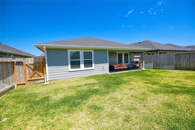 1219 Ricasoli Dr, Richmond, TX 77406 - back of house featuring an outdoor living space, a fenced backyard, a yard, and a patio area