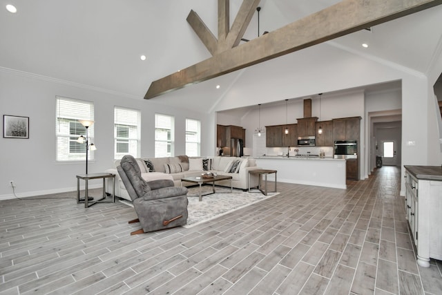 living area featuring beam ceiling, high vaulted ceiling, baseboards, and recessed lighting