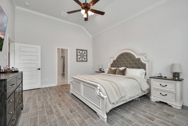 bedroom featuring vaulted ceiling, ornamental molding, ceiling fan, light wood finished floors, and baseboards