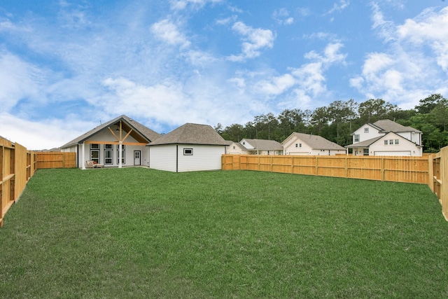 view of yard featuring a fenced backyard