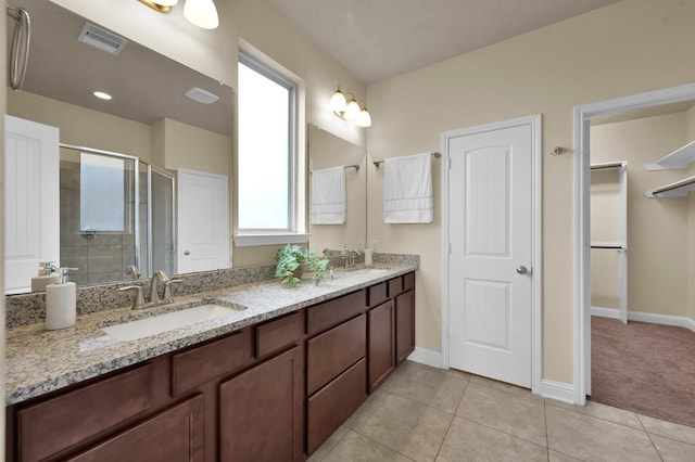 8107 Lockridge Terrace Ln, Cypress, TX 77433 - full bathroom featuring baseboards, visible vents, a shower stall, and a sink