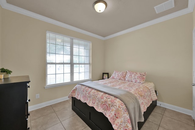8107 Lockridge Terrace Ln, Cypress, TX 77433 - bedroom with baseboards, visible vents, light tile patterned floors, and ornamental molding