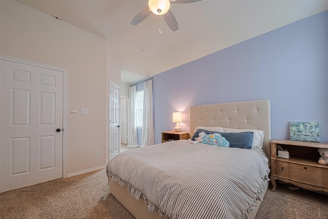bedroom with carpet flooring, a ceiling fan, and baseboards