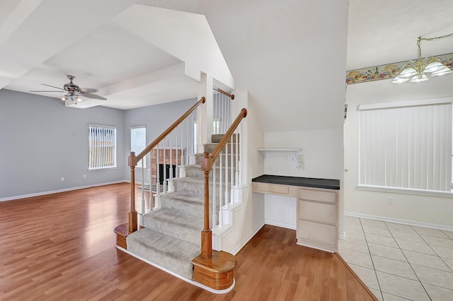 3006 Eagle Nest Ln, Humble, TX 77396 - stairs with wood finished floors, baseboards, and a ceiling fan