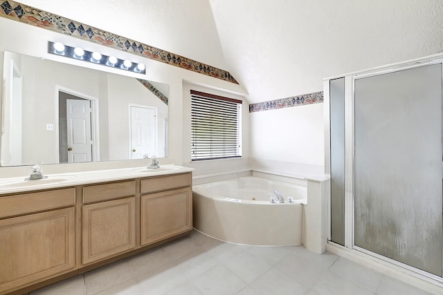 3006 Eagle Nest Ln, Humble, TX 77396 - full bath featuring lofted ceiling, a stall shower, a whirlpool tub, double vanity, and tile patterned flooring