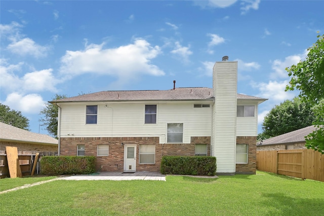 3006 Eagle Nest Ln, Humble, TX 77396 - rear view of property with brick siding, a chimney, and a patio