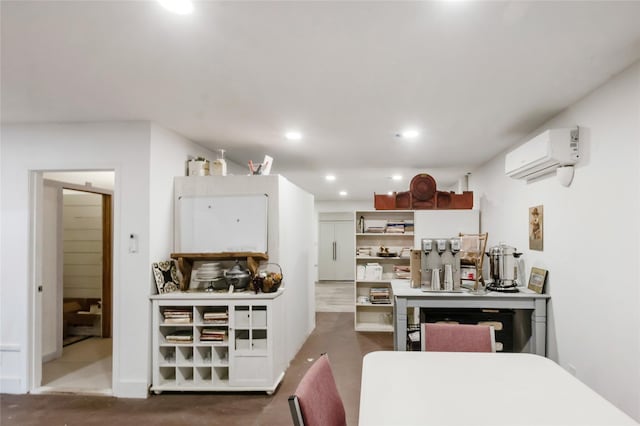 kitchen featuring recessed lighting and a wall mounted AC