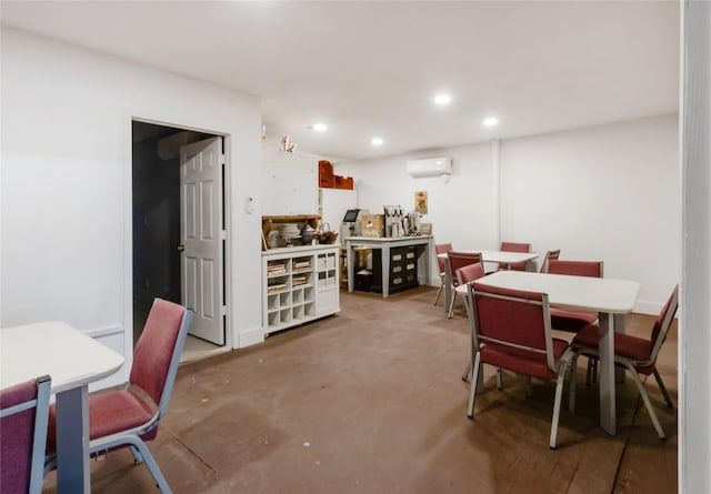 dining space with recessed lighting and a wall unit AC