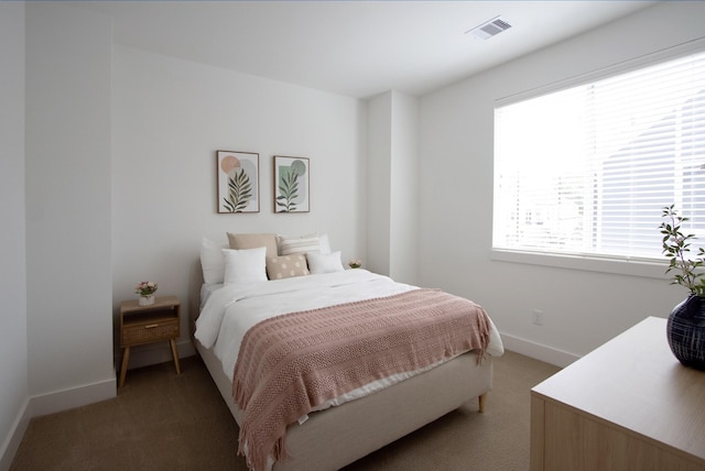 1546 W Tidwell Rd, Houston, TX 77091 - bedroom with light colored carpet and baseboards