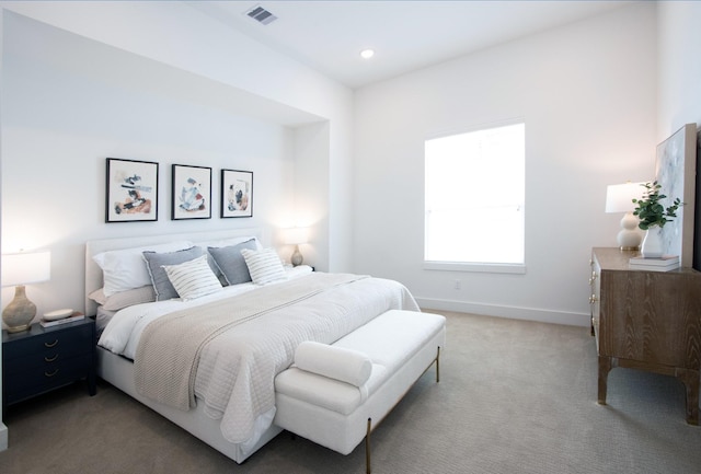 1546 W Tidwell Rd, Houston, TX 77091 - bedroom with light colored carpet, baseboards, and recessed lighting