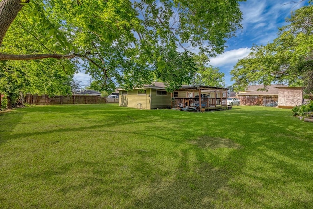 803 E 38th St, Houston, TX 77022 - view of yard with a wooden deck