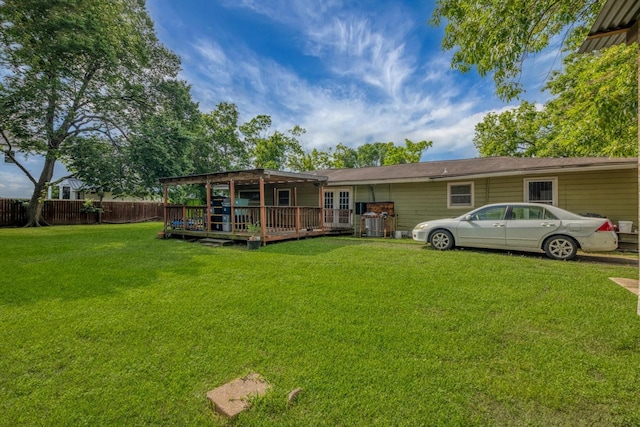 803 E 38th St, Houston, TX 77022 - rear view of property featuring a wooden deck