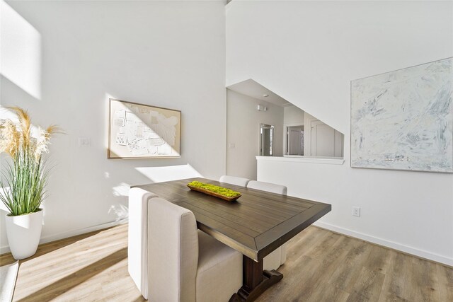 1207 Highland Vineyard Ln, Houston, TX 77091 - dining area featuring wood finished floors and baseboards