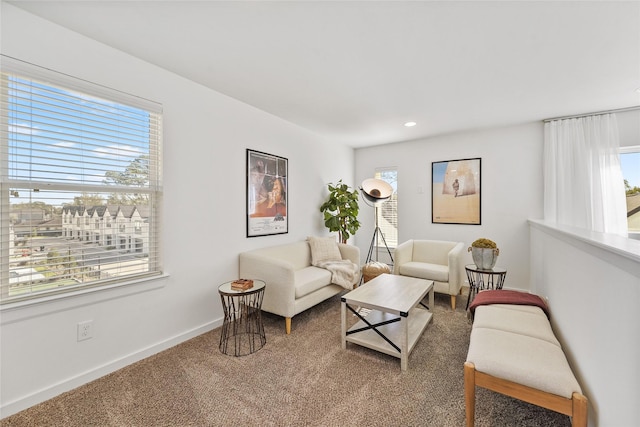1207 Highland Vineyard Ln, Houston, TX 77091 - living room featuring baseboards, recessed lighting, and carpet floors