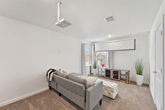 1207 Highland Vineyard Ln, Houston, TX 77091 - living area featuring carpet flooring, visible vents, and baseboards