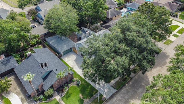 birds eye view of property with a residential view