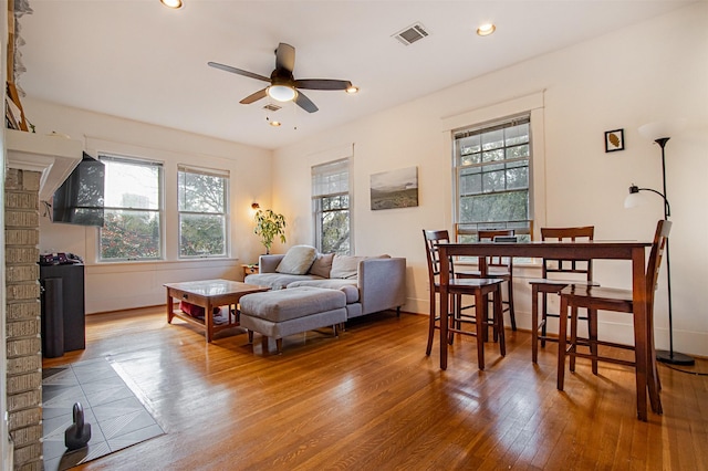 528 Hawthorne St, Houston, TX 77006 - living area featuring visible vents, a ceiling fan, hardwood / wood-style flooring, and a healthy amount of sunlight