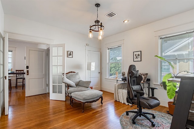 528 Hawthorne St, Houston, TX 77006 - office with recessed lighting, an inviting chandelier, light wood-type flooring, visible vents, and french doors