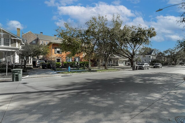528 Hawthorne St, Houston, TX 77006 - view of street with curbs, sidewalks, a residential view, and street lighting