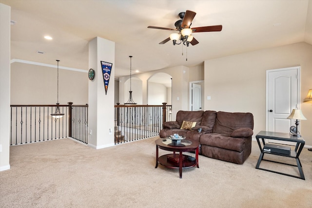 carpeted living area featuring recessed lighting, ceiling fan, and baseboards
