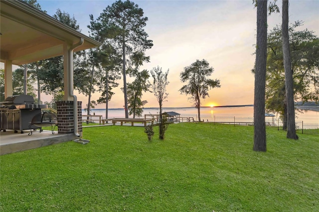 461 Pine Forest Acres Dr, Trinity, TX 75862 - view of home's community featuring a yard, a water view, and fence