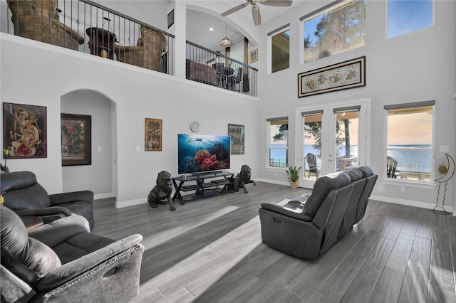 461 Pine Forest Acres Dr, Trinity, TX 75862 - living room featuring wood finished floors, a ceiling fan, and baseboards