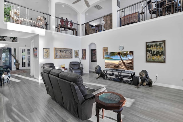 461 Pine Forest Acres Dr, Trinity, TX 75862 - interior space featuring visible vents, baseboards, recessed lighting, a towering ceiling, and wood finished floors